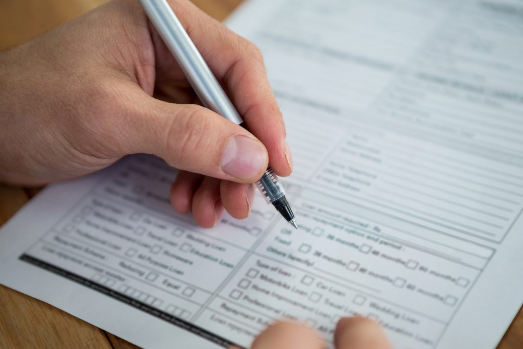 Blank form being filled out