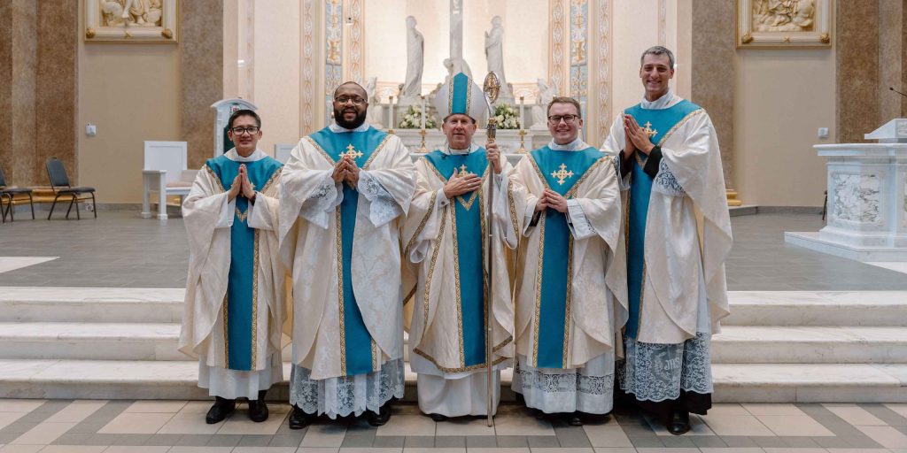 Bishop Spalding with newly ordained Rev. Joseph Ngo, Rev. Justin Farr, Rev. Christian Hamrick, and Rev. Joseph Hinderer in the Cathedral of the Incarnation in Nashville.